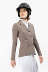 Beige Freejump Women's Show Jacket with dragonfly emblem on right shoulder.
