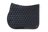 Black Saddle Pad with Rhinestone and Tone on Tone Piping, and small Animo logo on bottom of pad.