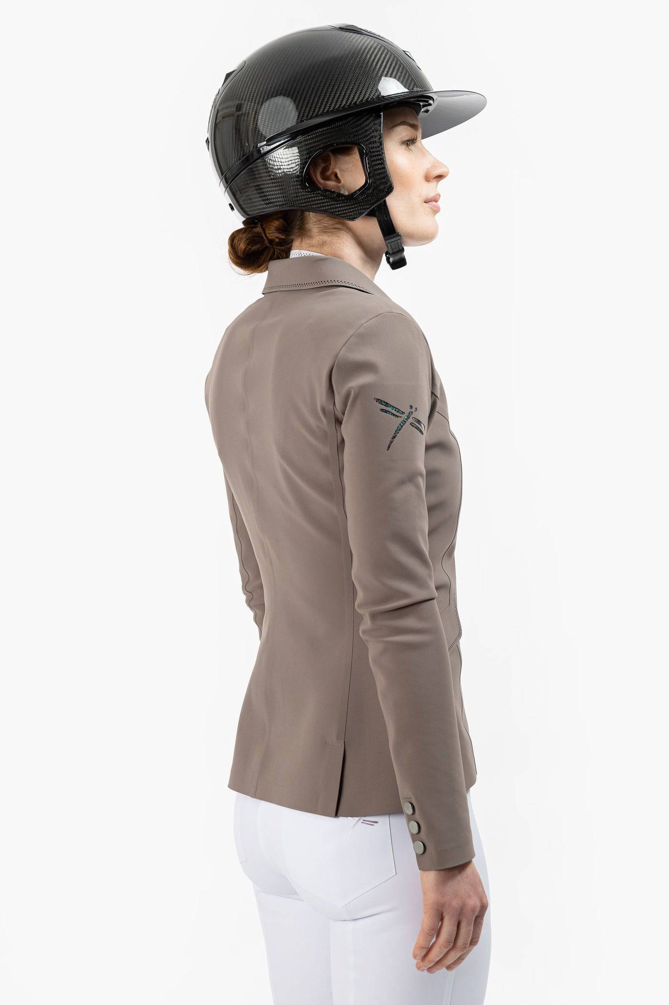 Back of Beige Freejump Women's Show Jacket with dragonfly emblem on right shoulder.