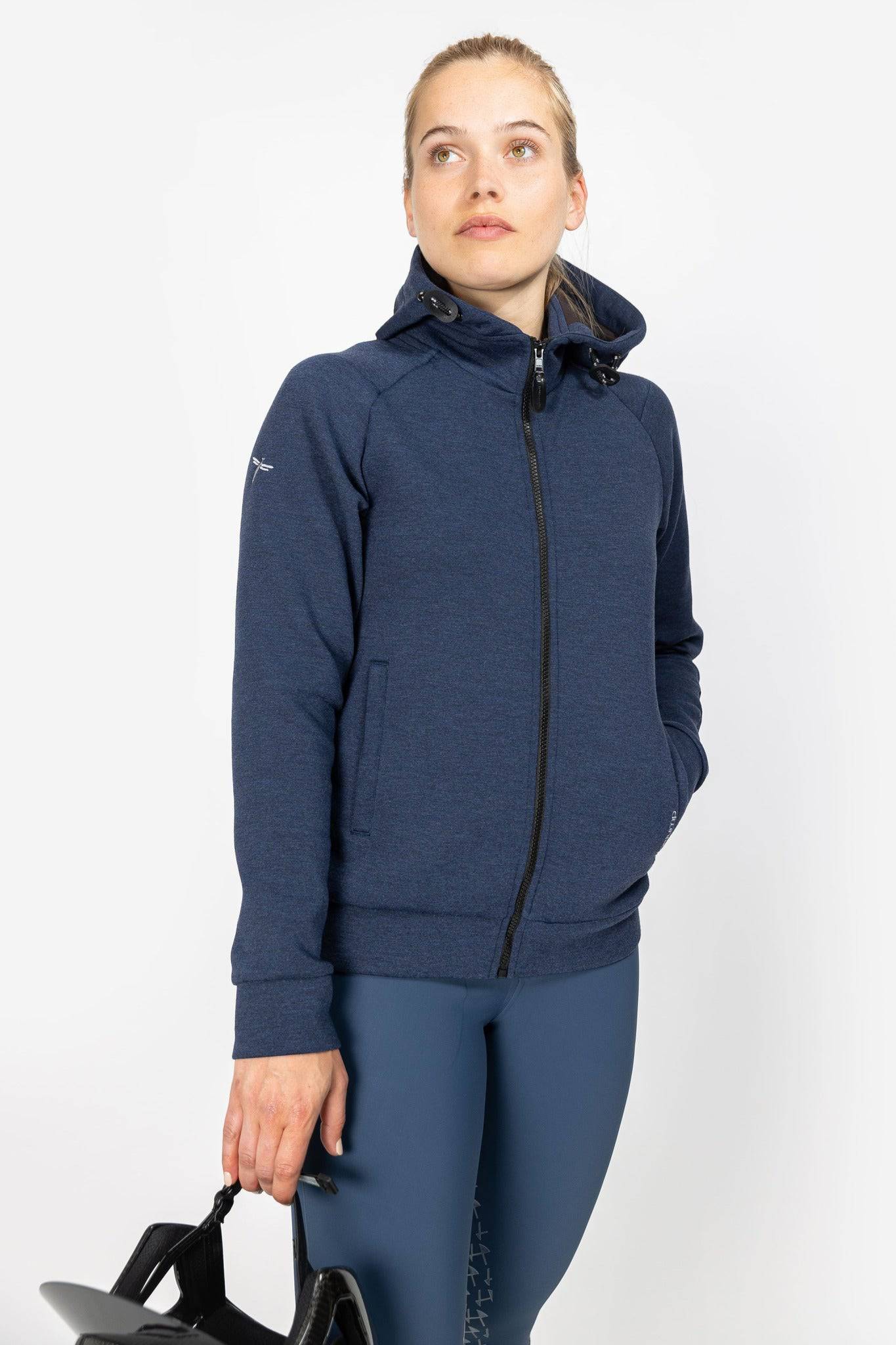 Heather Blue Freejump Women's full zip hoodie with raised neckline and dragonfly emblem on right shoulder