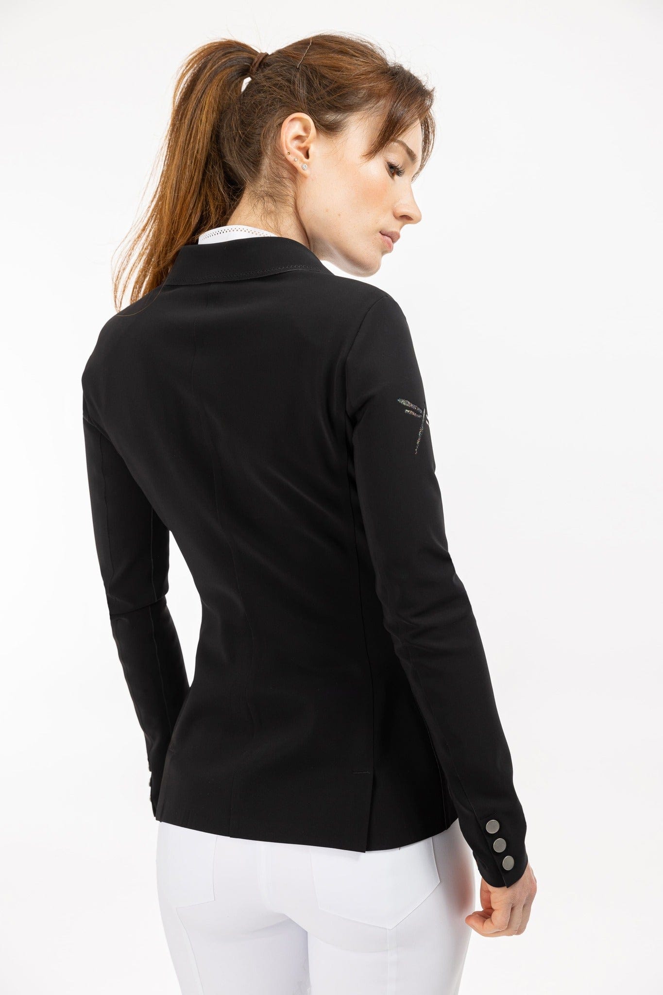 Back of Black Freejump Women's Show Jacket with dragonfly emblem on right shoulder.