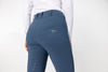 Back of Neptune Blue Women's Freejump Breeches with perforated back pockets and dragonfly emblem on right pocket, and silicone “Griptec” technology  on inside leg