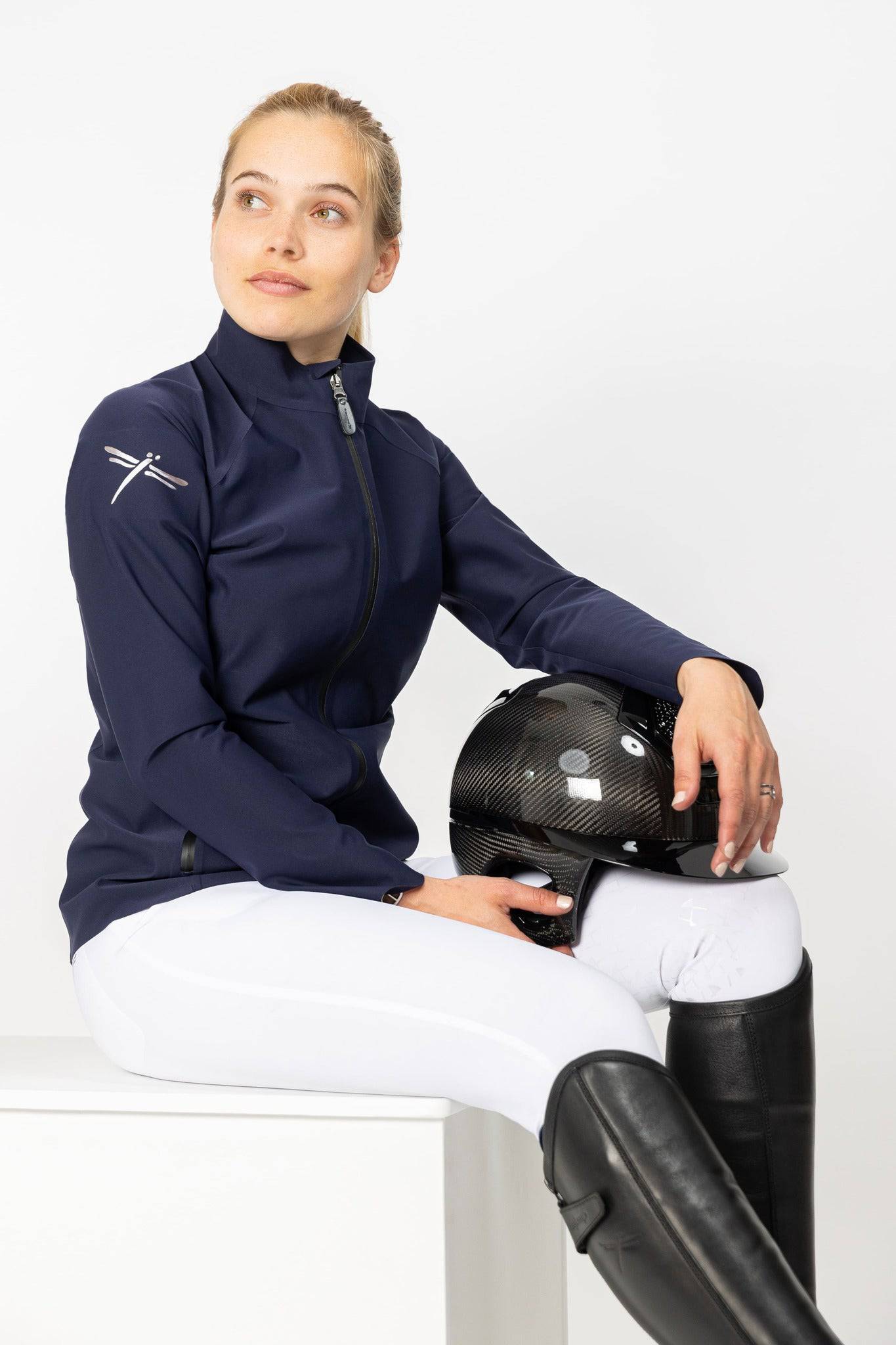 Navy Freejump Women's Rain Jacket with Dragonfly emblem on right shoulder