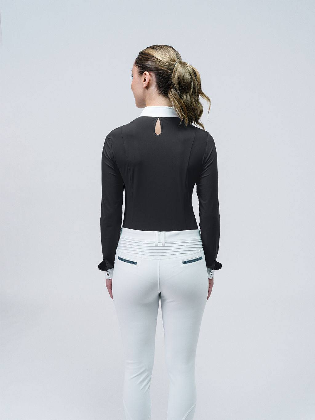 Back of Black Long Sleeve Show Shirt w/ all white bib decorated with Swarovski® crystals. 1/4 zip