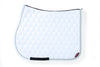 White Saddle Pad with Rhinestone and Tone on Tone Piping, and small Animo logo on bottom of pad.